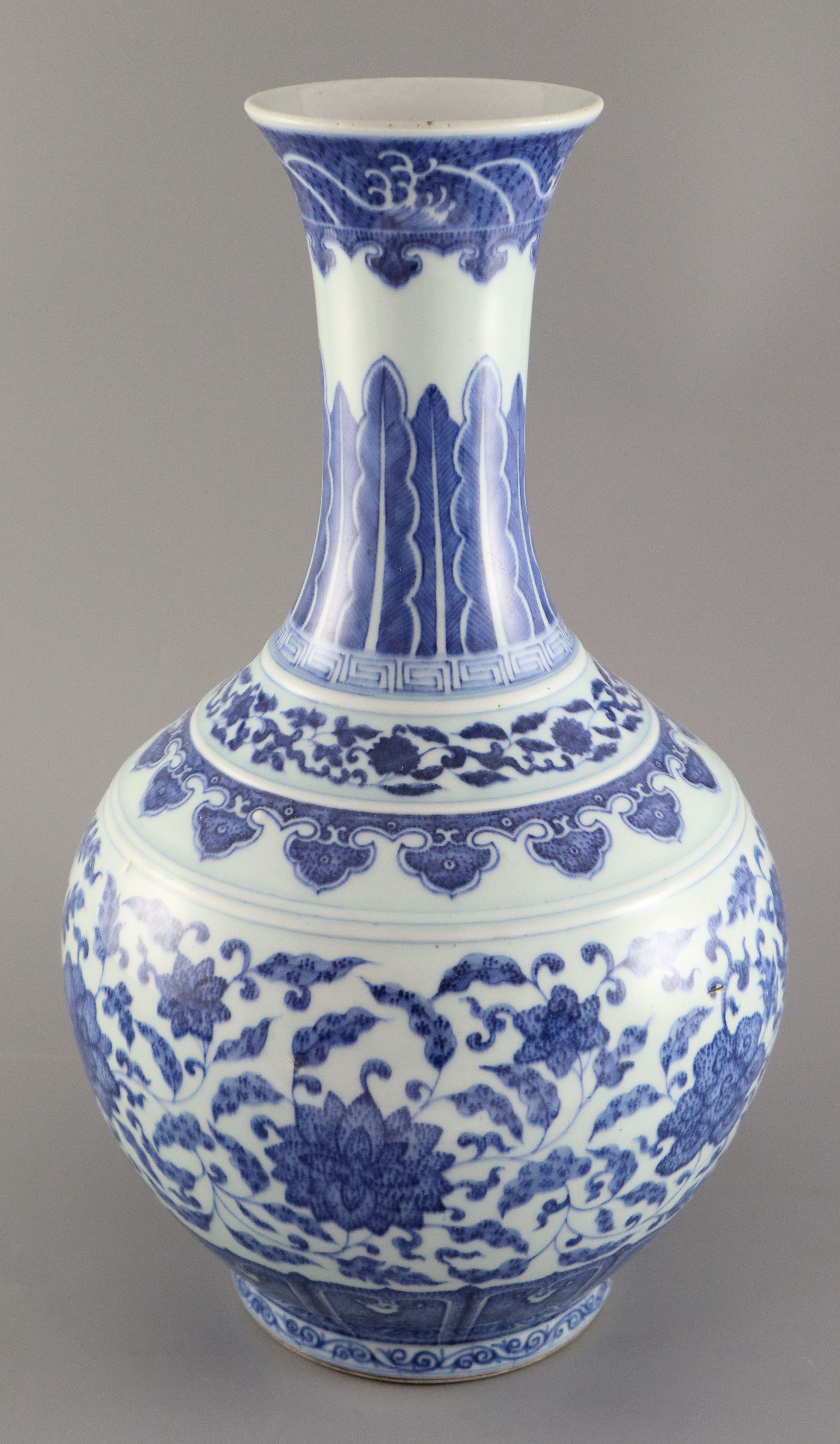 A Chinese blue and white Ming style bottle vase, Qianlong six character mark but later, 41.5cm high